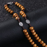 Chapelet Catholique Croix Argenté perles de bois et collier de cordes tissées détails du chapelet
